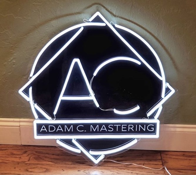 Custom Neon® white logo on black backing @adamcmastering