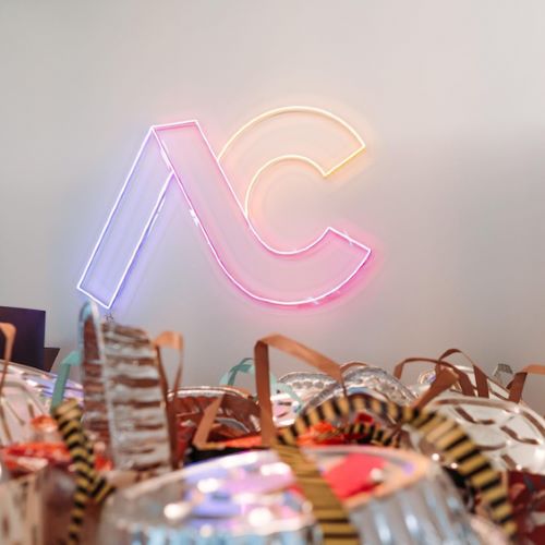 Custom Neon® multicolor logo @armcandyagency