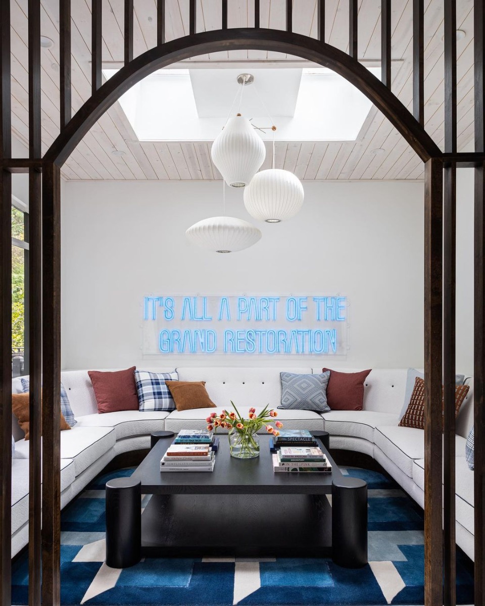 Blue Custom Neon® sign on white living room wall @bpatrickflynn