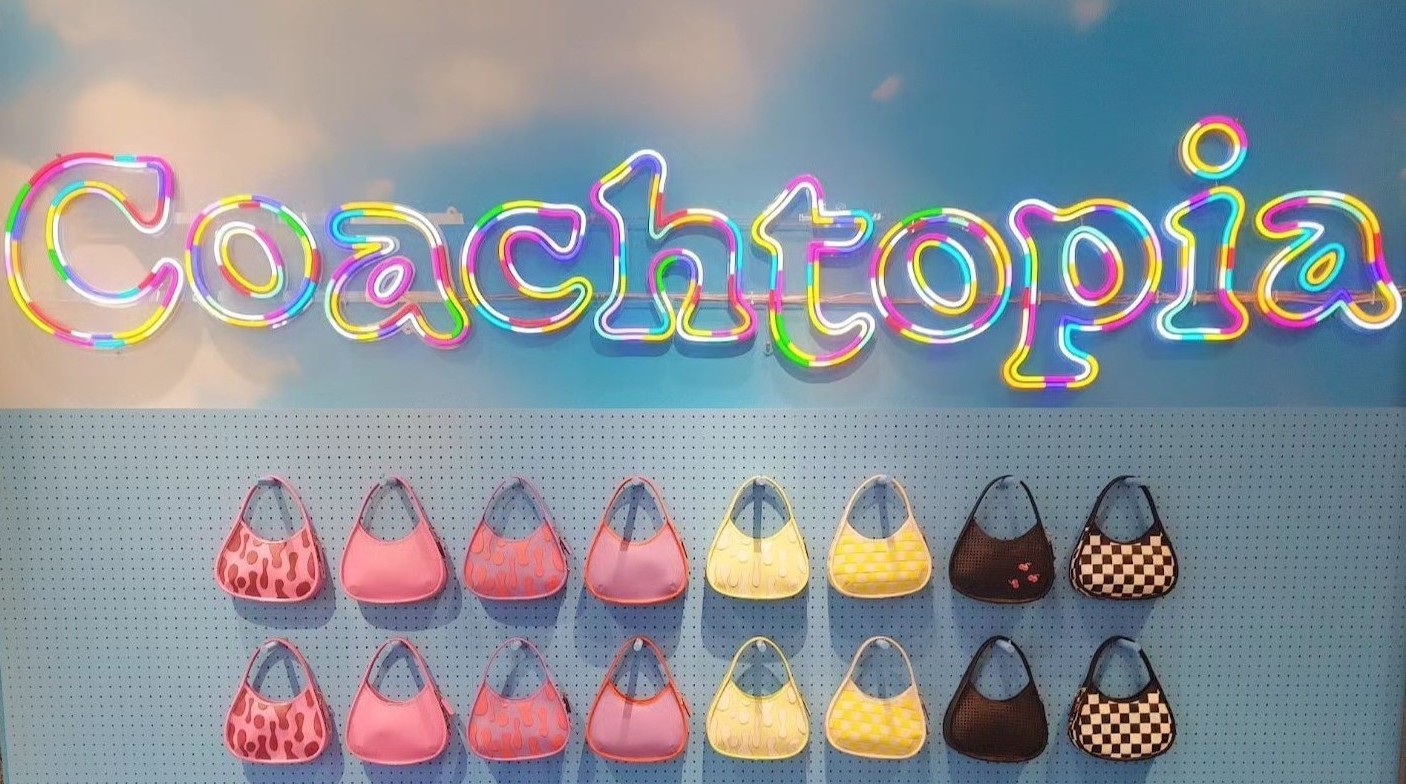 Custom Neon® retail wayfinding signage @coach_japan