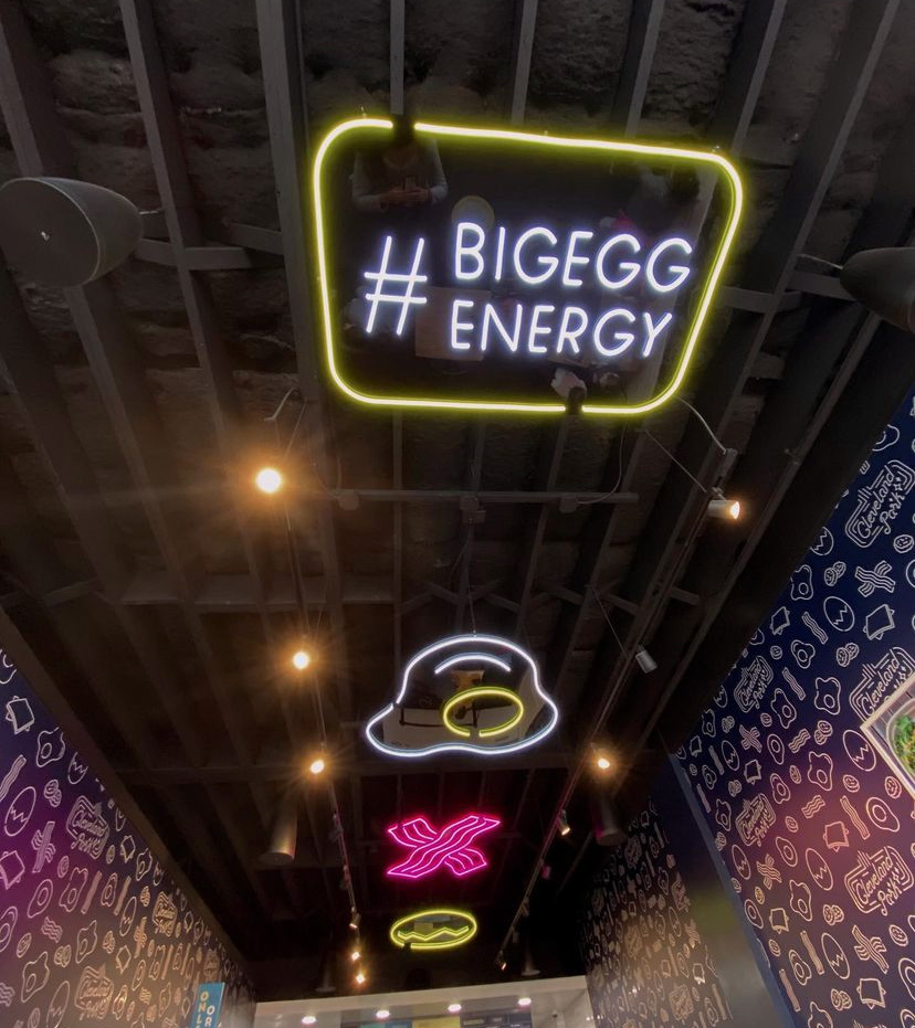 Custom Neon® pink white & yellow signs @crackedeggery