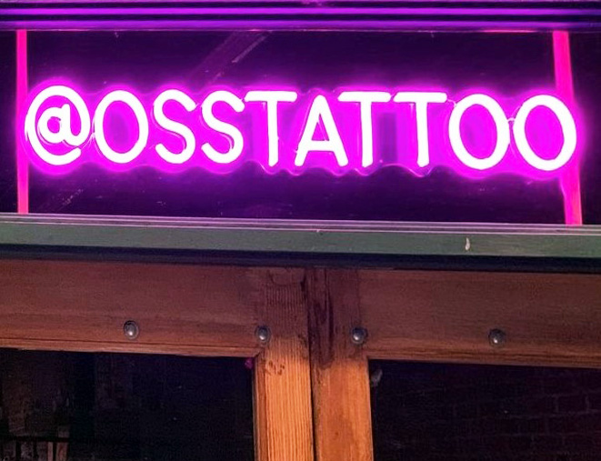 Large neon pink social media handle sign by Custom Neon® for @osstattoo