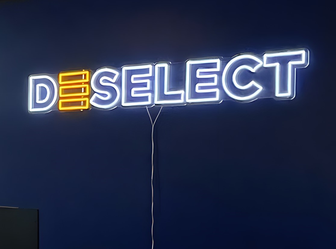 Custom Neon® white and yellow logo deselect.com/
