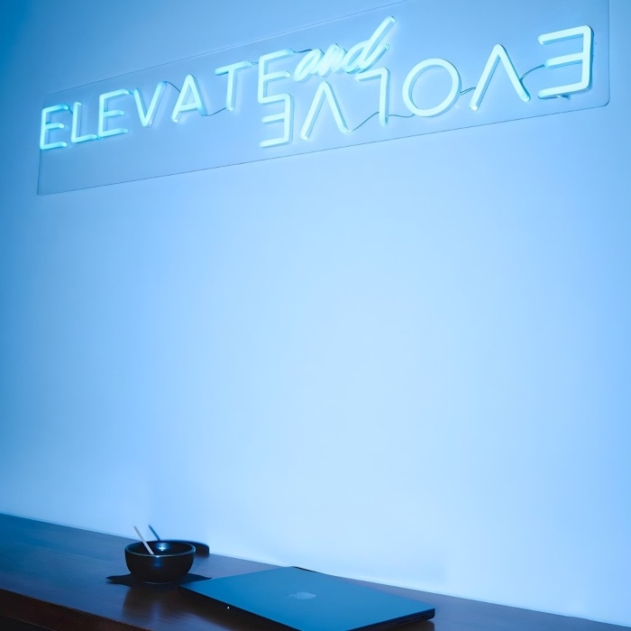 Elevate and evolve motivational office sign by Custom Neon® for @zcospaceclubhouse
