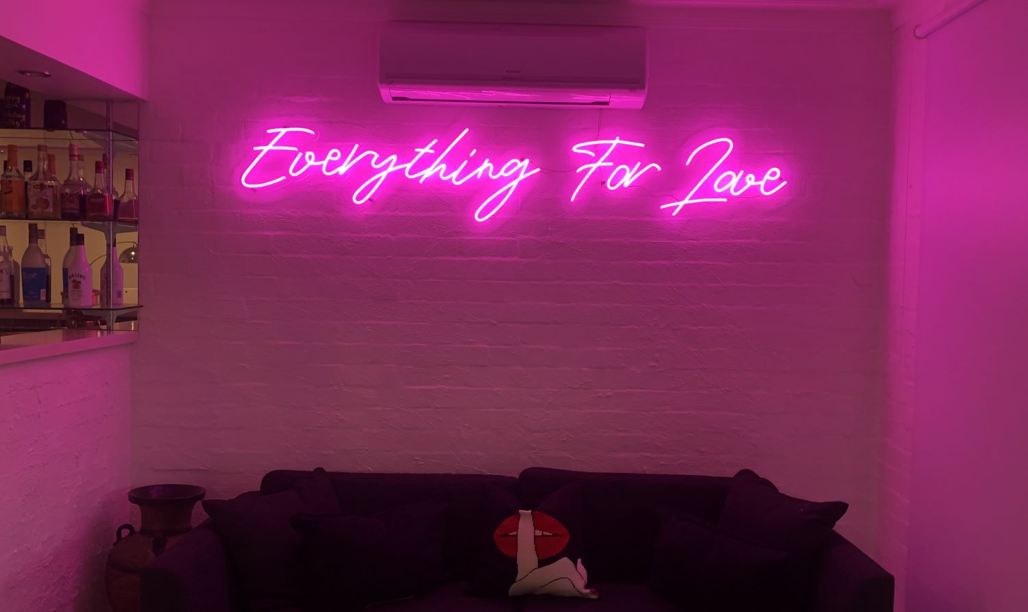 Everything for Love pink Custom Neon® sign in living room