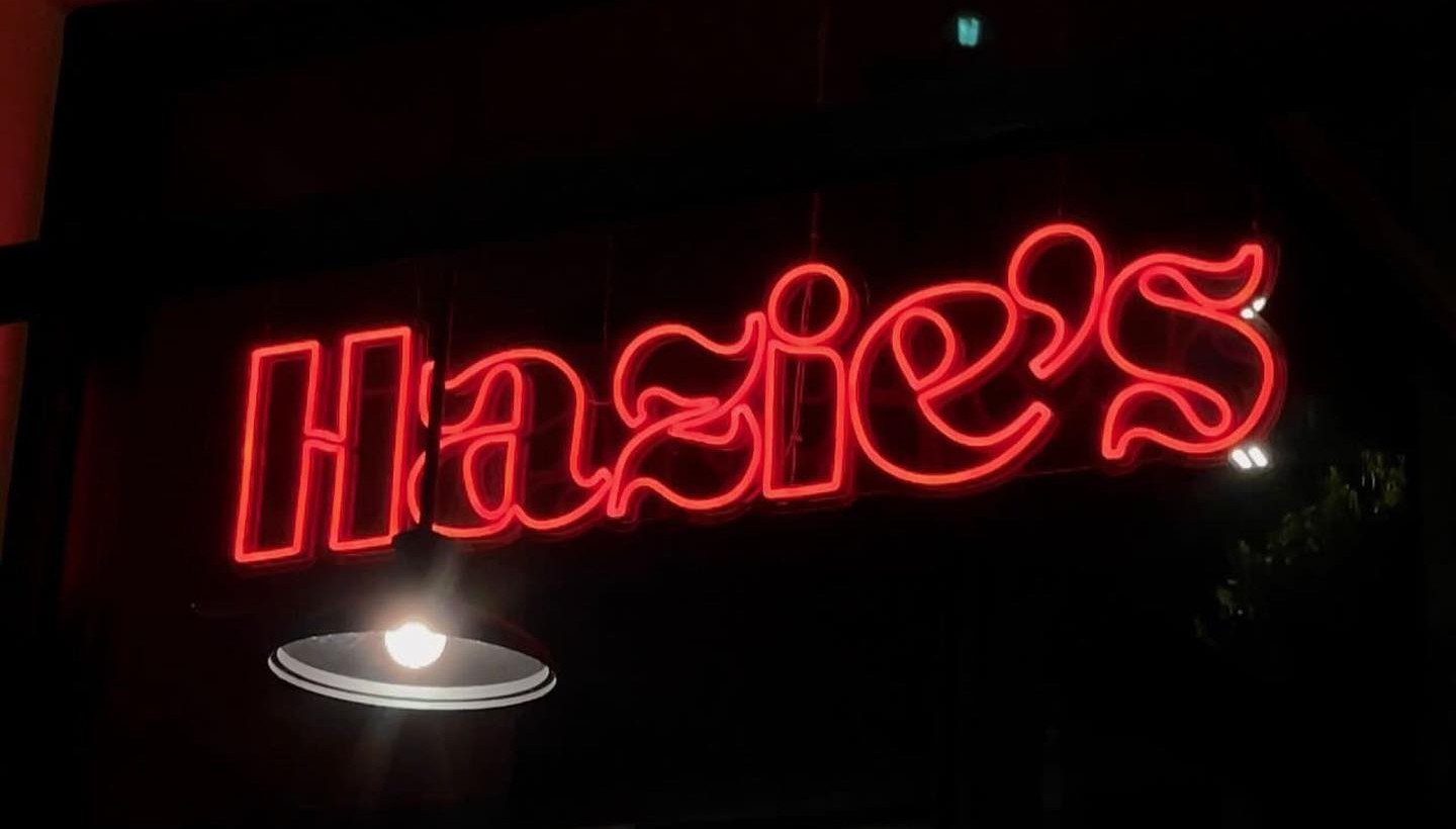 Red Hazie's restaurant name sign by Custom Neon® @haziesonhayes