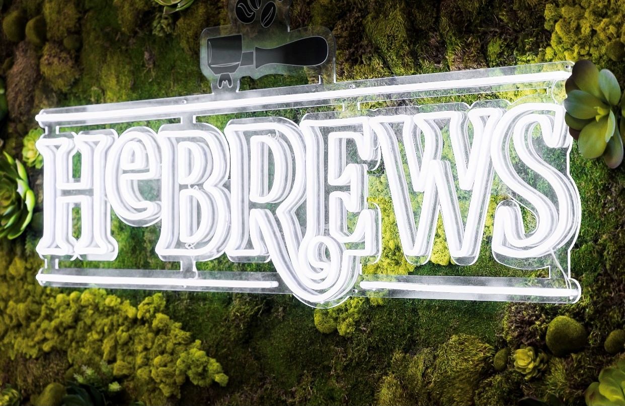 Custom Neon® white LED and UV print logo for coffee retailer