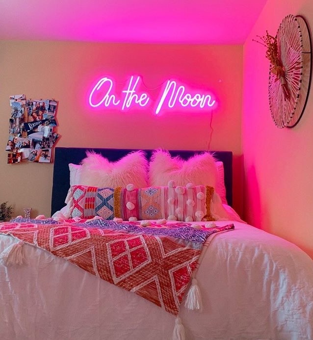 Custom Neon® pink sign above a bed @malloryonthemoon