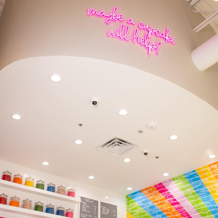 Pink Custom Neon® quote sign @smallcakescupcakery @studioa28
