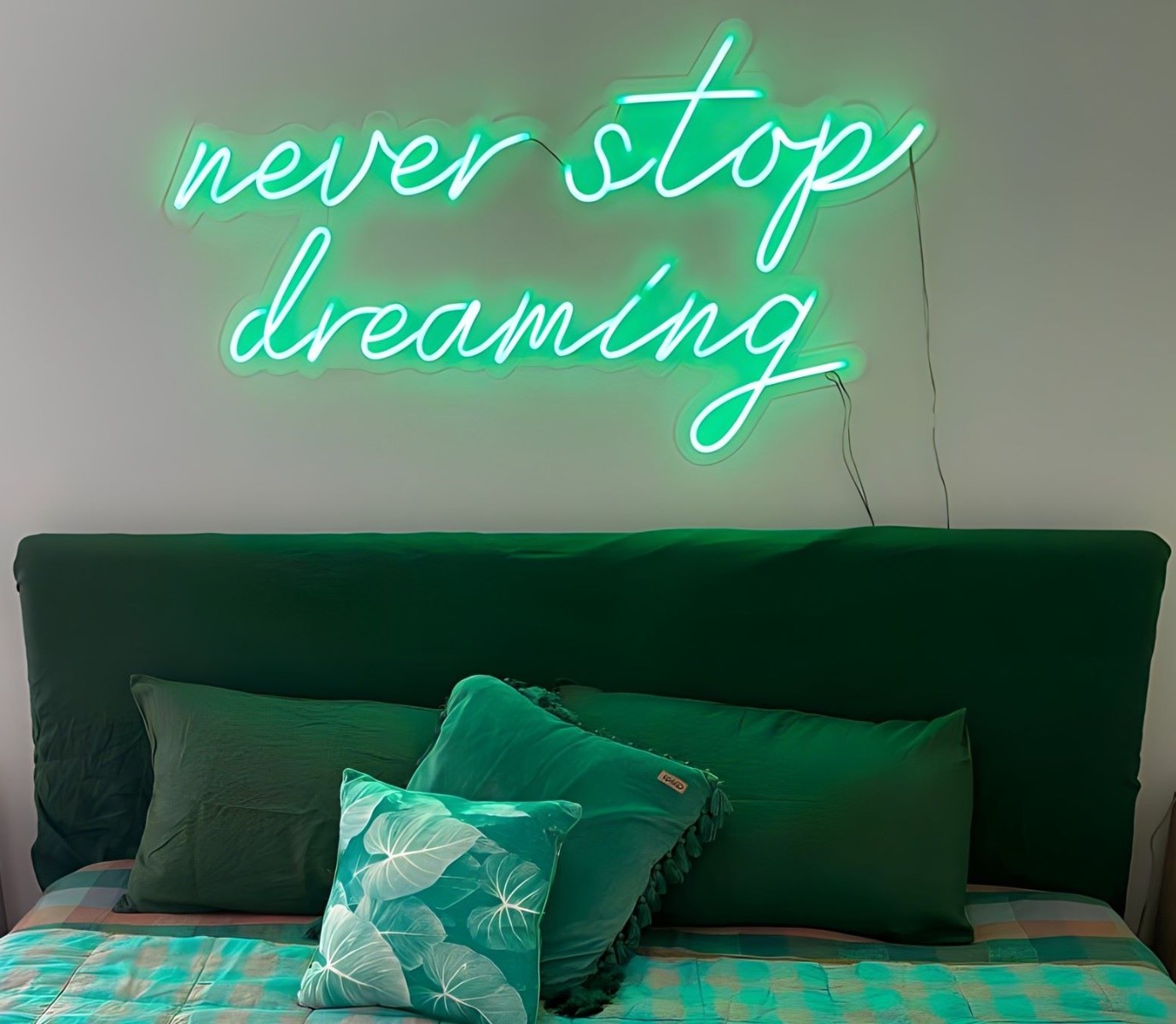 Never Stop Dreaming green Custom Neon® bedroom sign