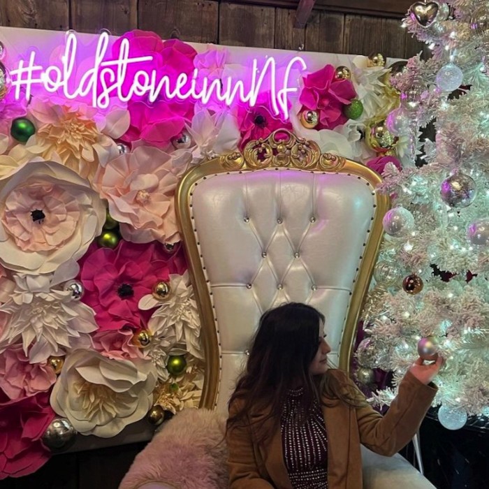 theoldstoneinnnf Custom Neon® pink hashtag sign on a rose wall at The Old Stone Inn in Niagara Falls @oldstoneinnnf