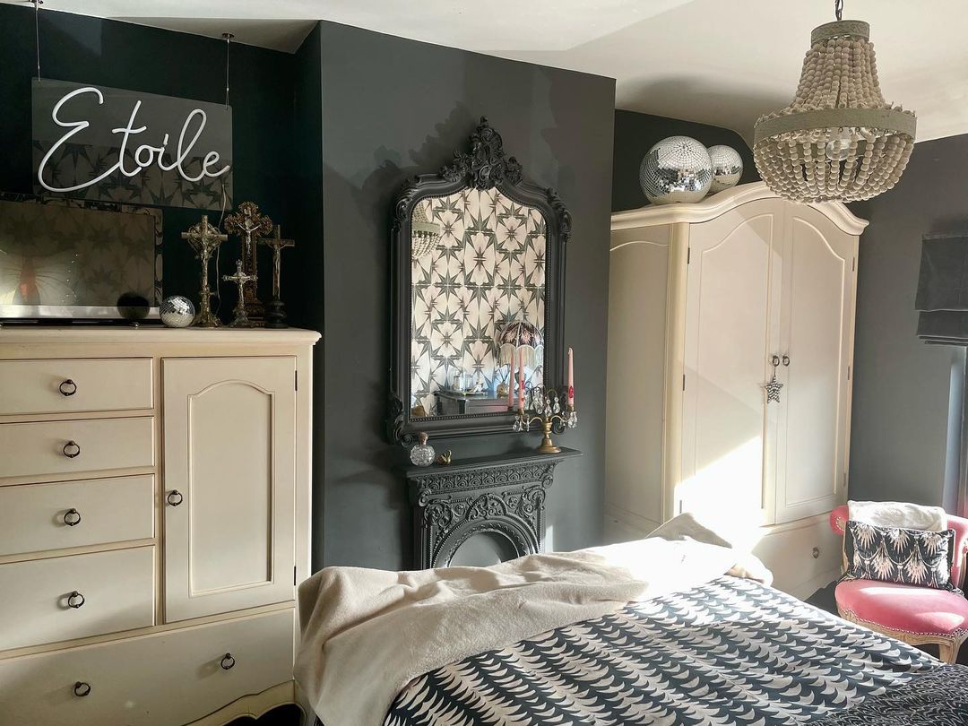 Custom Neon® white name sign on black bedroom wall - decor by @cherubandcrown