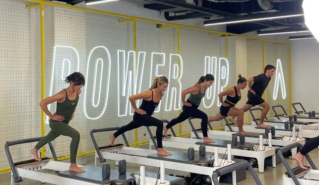 Massive Custom Neon® word sign for gym studio @upstate_studios
