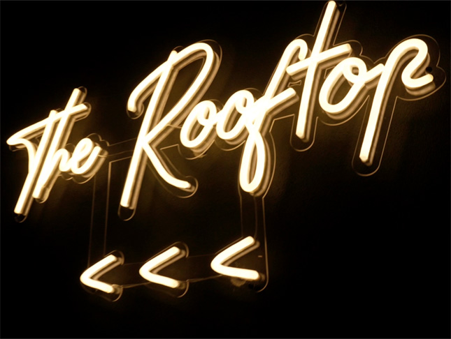 Custom Neon® warm white The Rooftop directional arrow sign @thebeaufortperth
