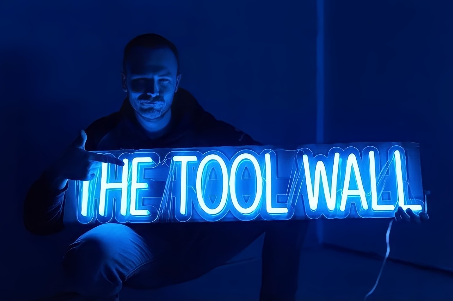 The Tool Wall blue Custom Neon® quote sign in a garage man cave