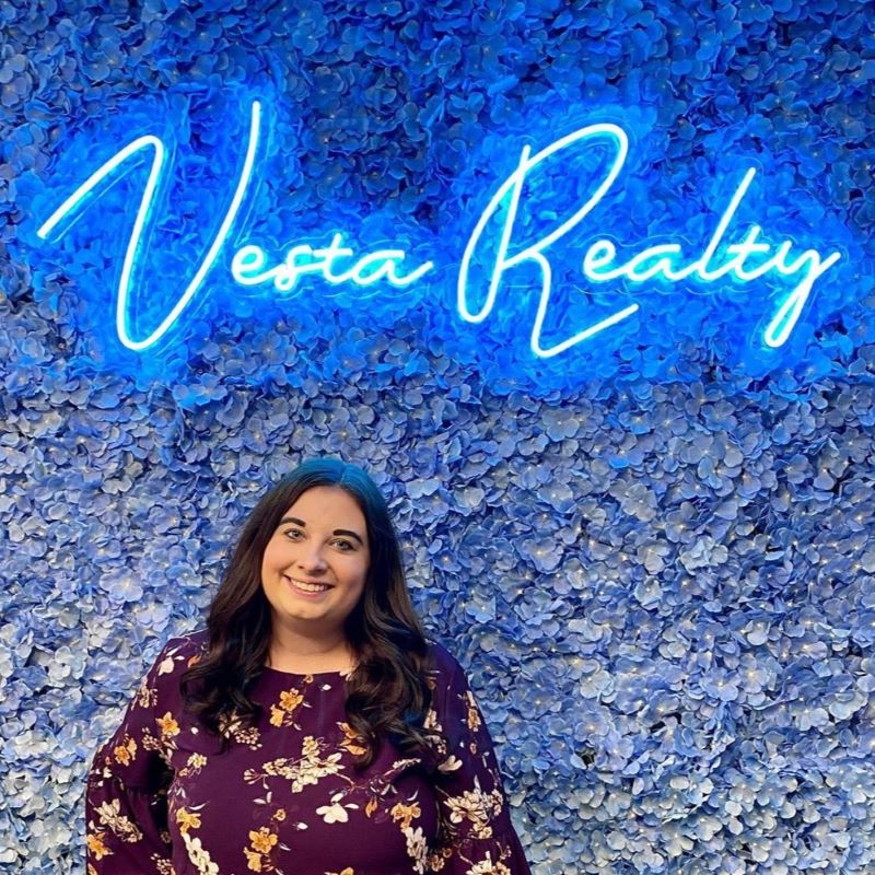 Blue Custom Neon® sign @vestarealty