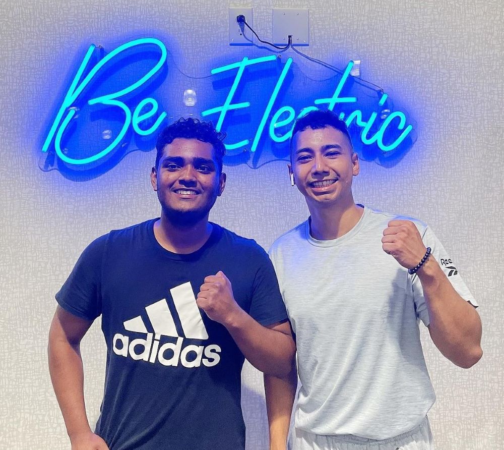 Custom Neon® blue selfie wall sign @vnv.fit