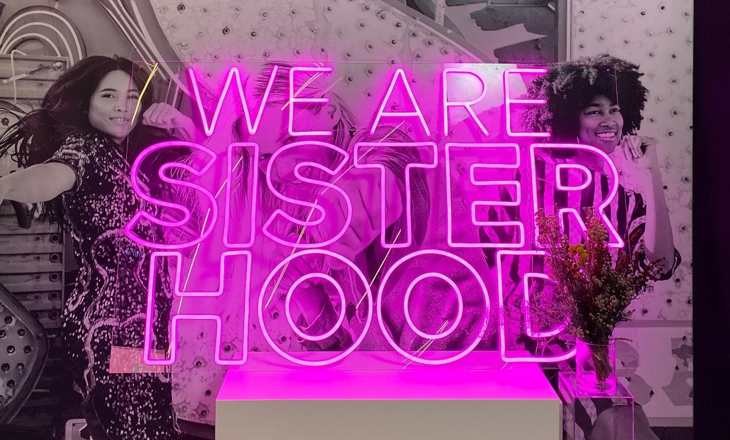 Custom Neon® pink selfie sign We Are Sisterhood